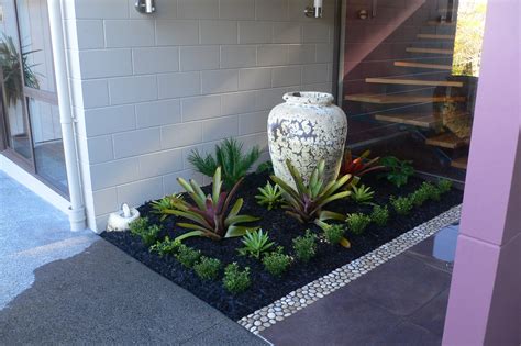 A small garden at a front entrance. Designed and implemented by Fusion Landscape Design. Patio ...