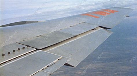 Plane wing flaps moving during flight - Stock Video Clip - K008/9873 - Science Photo Library