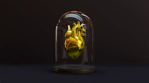 Premium Photo | Golden anatomical heart in jar