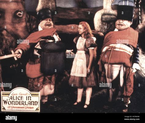 ALICE IN WONDERLAND, Jack Oakie as Tweedledum, Charlotte Henry as Alice, Roscoe Karns as ...