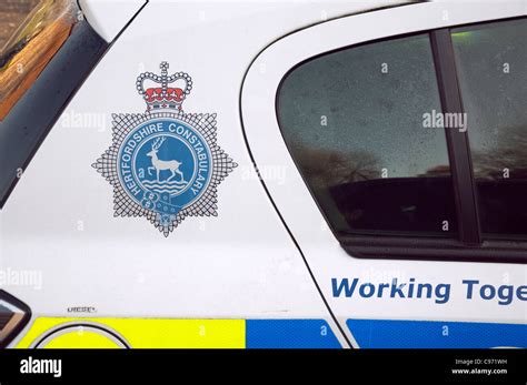 Hertfordshire Constabulary emblem, logo on the side of a police car Stock Photo - Alamy