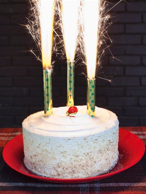 Throw a Stylish Fourth of July Party | Cake sparklers, Wax candles and Wax