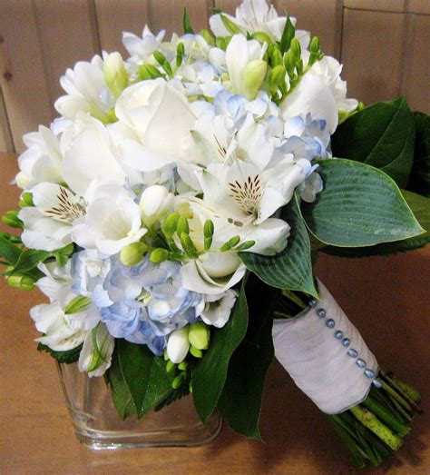 Bridal Bouquet with blue hydrangea, white freesia, alstroemeria and import roses | Flower ...