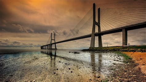 Bridge, sky, landmark, vasco da gama bridge, horizon, sunset, calm ...