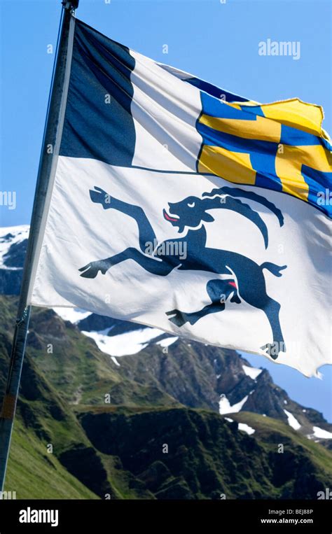 Graubunden flag, Lucomagno, Switzerland, Europe Stock Photo - Alamy