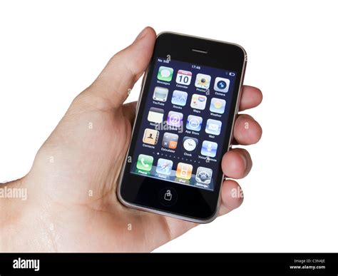 Apple IPhone 3s, the third generation smart phone displaying the home ...