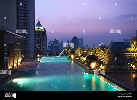 Illuminated pool on the roof of Hotel Banyan Tree, Bangkok, Thailand Stock Photo - Alamy