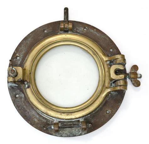 Lot - BRASS SHIP''S PORTHOLE Diameter of glass 6.5". Diameter overall 12".