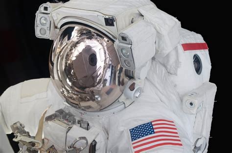 Astronaut's helmet visor during a spacewalk Poster Print - Walmart.com ...