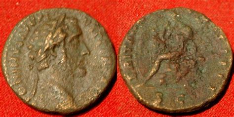 ANTONINUS PIUS AE as. ROMAN BRITAIN, Britannia seated on rock. Rare