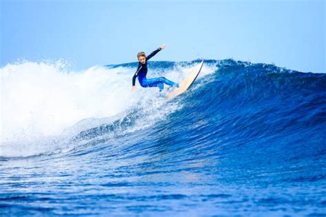 Kids Surfing Stock Photos, Pictures & Royalty-Free Images - iStock