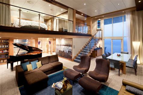 The Royal Loft Suite aboard Oasis of the Seas offers guests a two-story ...