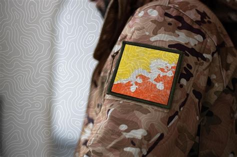 Premium Photo | Bhutan soldier soldier with flag bhutan bhutan flag on ...