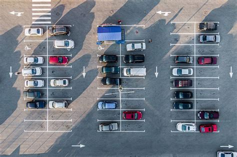 parking near the mall. colored cars in a supermarket parking lot. view ...