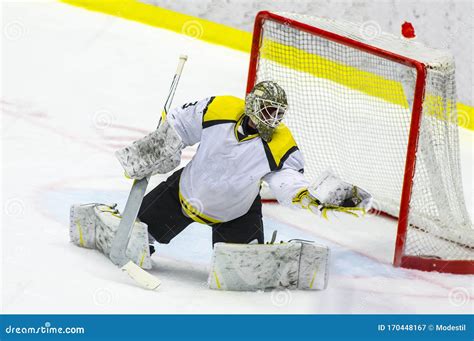 Ice Hockey Goalie Makes a Glove Save Stock Image - Image of goal ...