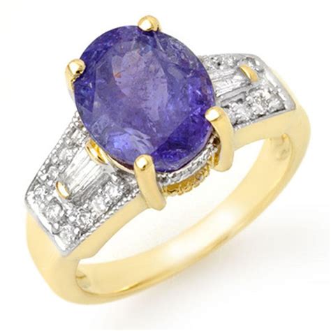 Lot - 5.55 ctw Tanzanite & Diamond Ring 10k Yellow Gold - REF-144K8Y