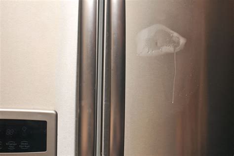 How to Fix a Dent on a Stainless Steel Fridge | Homesteady | Stainless steel fridge, Stainless ...