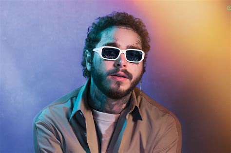 Post Malone models sunglasses inspired by his face tattoos