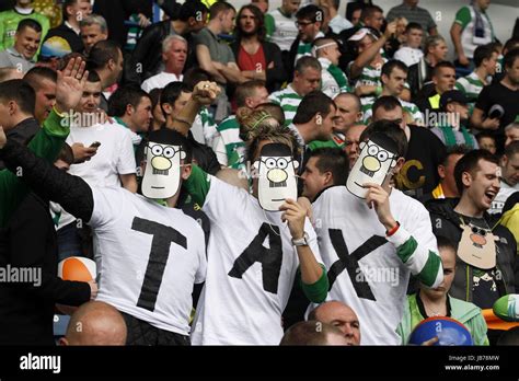 CELTIC FANS WITH TAX MAN MASKS RANGERS V CELTIC FC IBROX GLASGOW ...