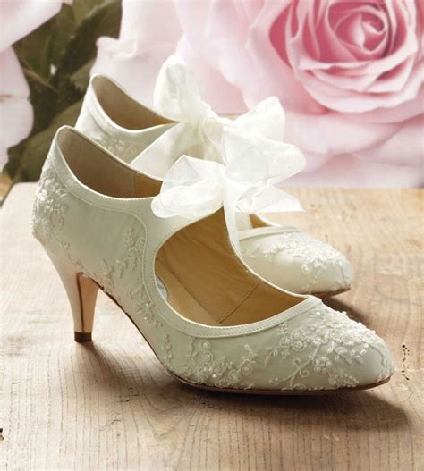 Beautiful Ivory Low Heel Bridal Shoes Mixed With Artistic Floral ...