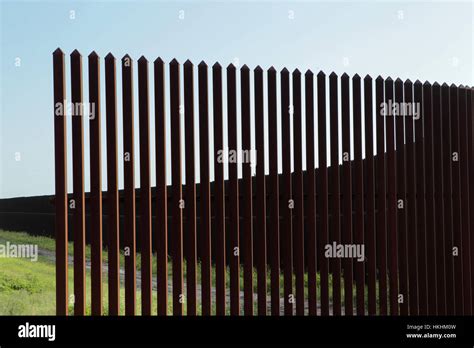 Border fence along the Texas-Mexico border near Brownsville, Texas ...