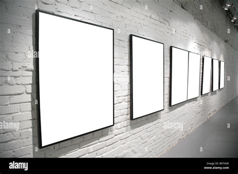 frames on brick white wall Stock Photo - Alamy