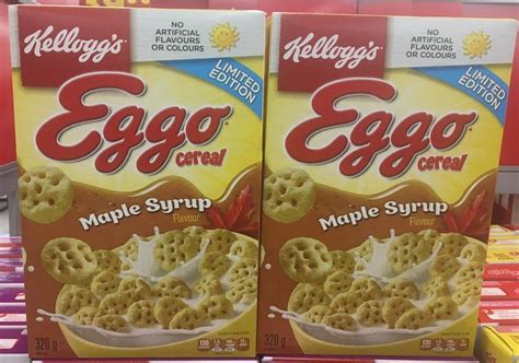 two boxes of eggo cereal on display for sale in a grocery store's aisle