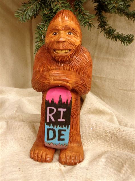 Hand carved wood Sasquatch or Bigfoot sculpture with a snowboard by Dan and Debbie Easley | Hand ...
