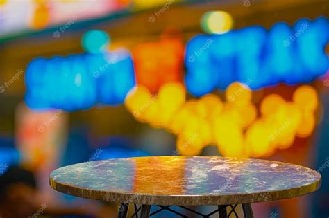 Premium Photo | 3D Rendering,Empty marble table for display of products in front of restaurant ...