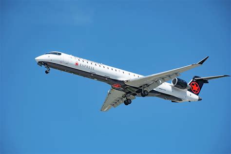 Jet Plane Landing Photograph by Dominador Kebeng - Fine Art America