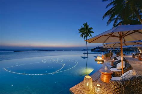 The Nautilus Maldives Luxury Resort - Thiladhoo Island, Maldives - Resort Infinity Pool Dusk ...