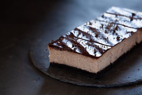 Cheesecake with Chocolate Glaze, Summer Dessert on Black Plate Stock ...