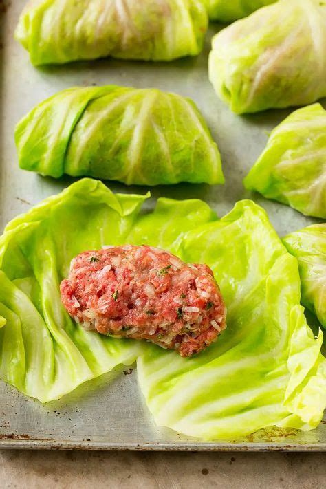 Ground beef and rice on cooked cabbage leaves. | Cabbage recipes, Best ...