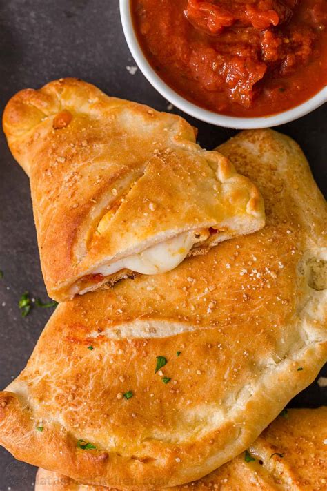 Easy Calzone Recipe - NatashasKitchen.com