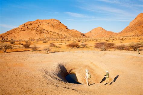 Family Hiking in Spitzkoppe Namibia Stock Photo - Image of rural ...