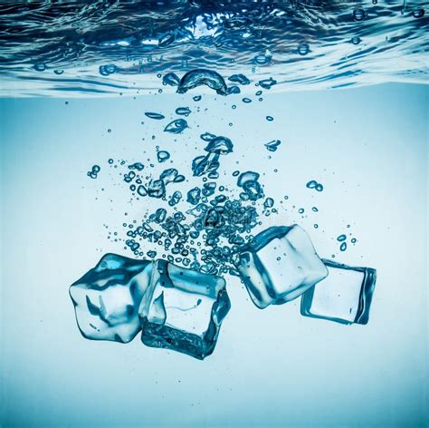 Ice Cubes Falling Under Water Stock Photo - Image: 42216624