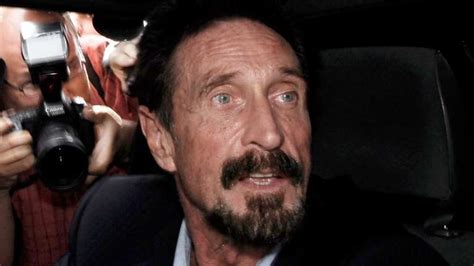 John Mcafee Belize / Eccentric software millionaire John McAfee flees ...