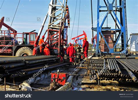 Oil Field Oil Workers At Work Stock Photo 526567864 : Shutterstock