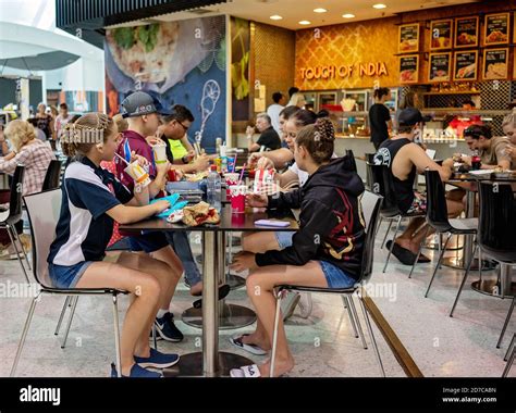 Brisbane, Queensland, Australia - 28th September 2019: Children and adults eating lunch in a ...