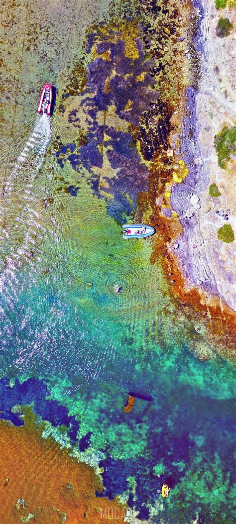 drone view of boats in colorful shallow waters in catalunya spain, _cadaque colour, Oppo Reno4 ...