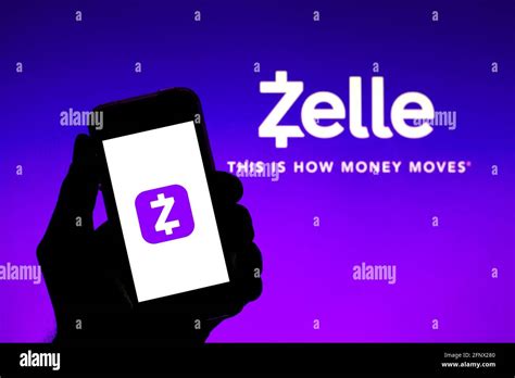 In this photo illustration a Zelle app seen displayed on a smartphone ...