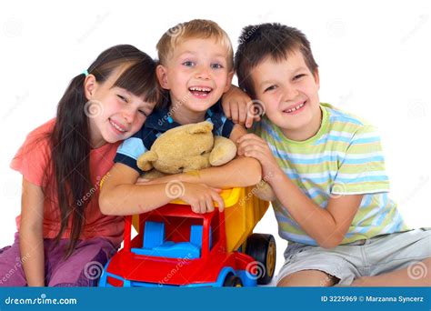 Happy children with toys stock image. Image of friend - 3225969