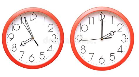 Analog clocks on red wall stock image. Image of timepiece - 3421463