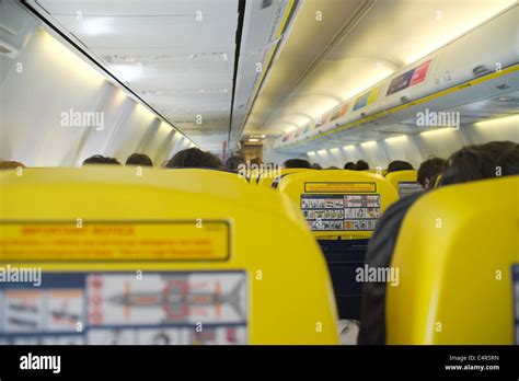 Ryanair Boeing 737-800 interior view with passengers, shallow DOF Stock ...