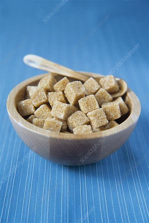 Brown sugar cubes - Stock Image - H110/3135 - Science Photo Library