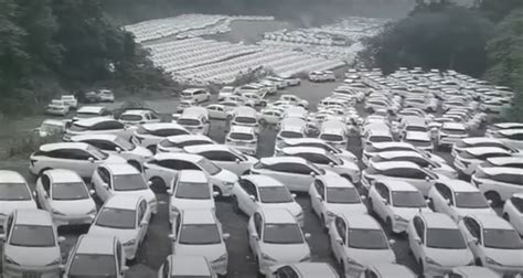 See China’s Abandoned EV Graveyard: Thousands Of Cars Rot In Huge