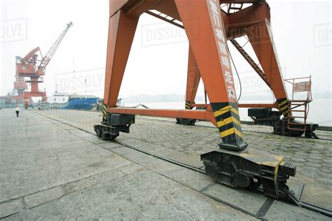 Loading crane on rails in shipyard - Stock Photo - Dissolve