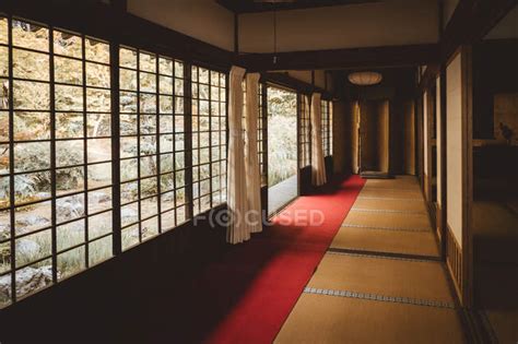 Minimalistic interior and light windows in traditional Asian house ...