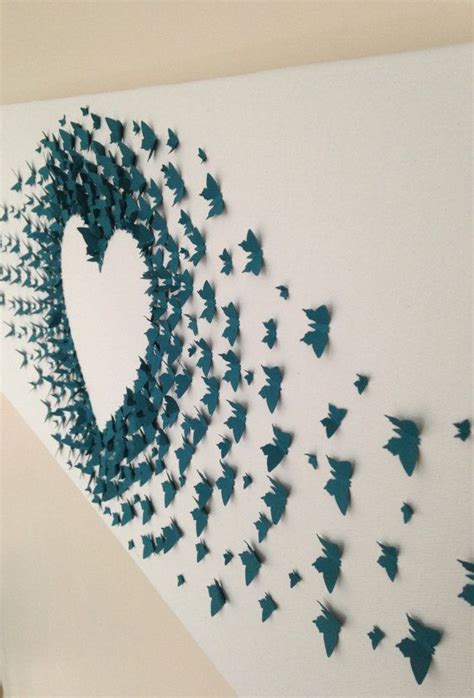 there is a heart made out of butterflies on the wall and it looks like they are flying in the air