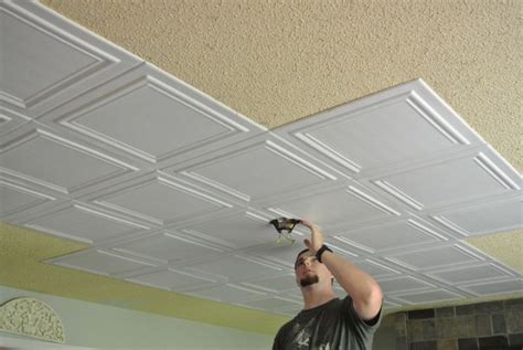 Painting styrofoam ceiling tiles - stockWas